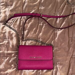 Michael Kors Pink Leather Crossbody Bag with Flap Closure